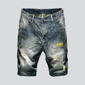 Distressed vintage men's denim shorts