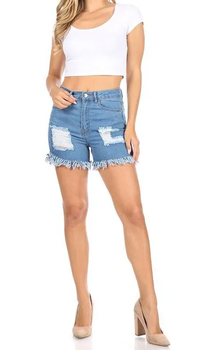 Ripped denim shorts with cut-off frayed hem